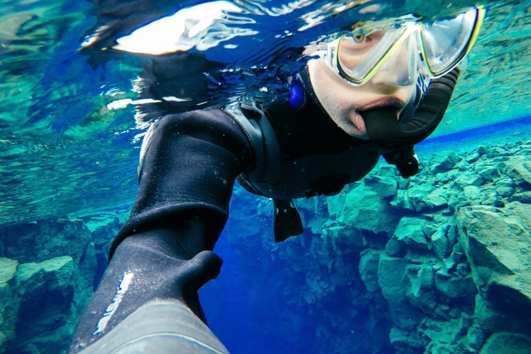 Snorkeling or Diving Silfra is a Must While You're in Iceland