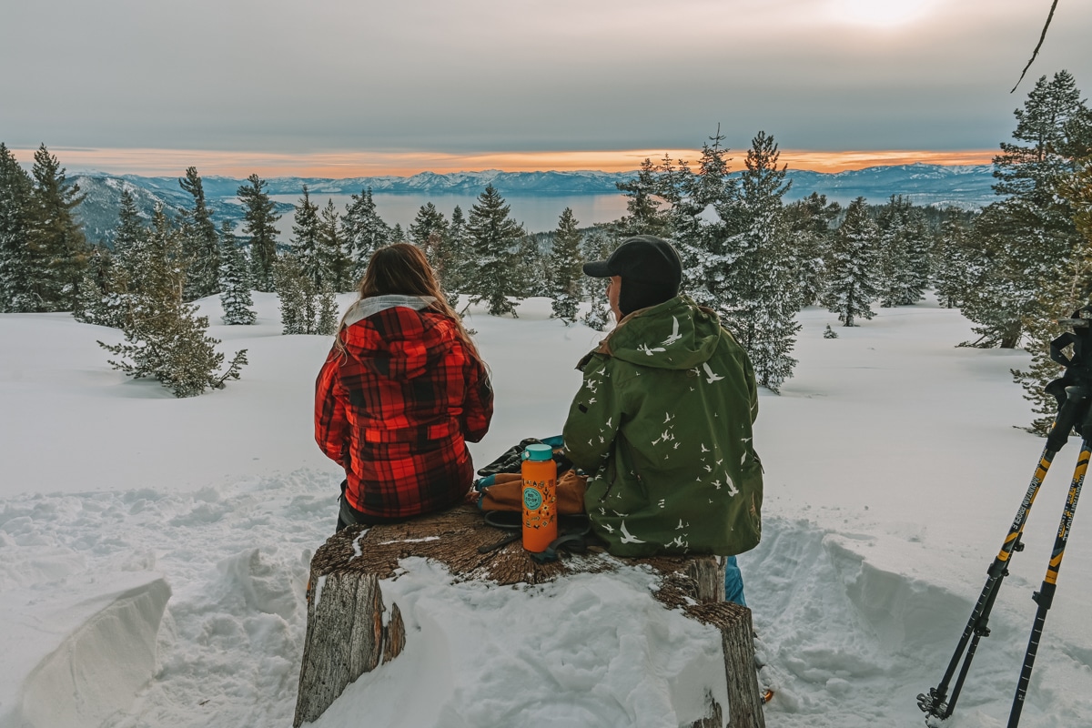 Two women relaxing after snowshoeing at Lake Tahoe