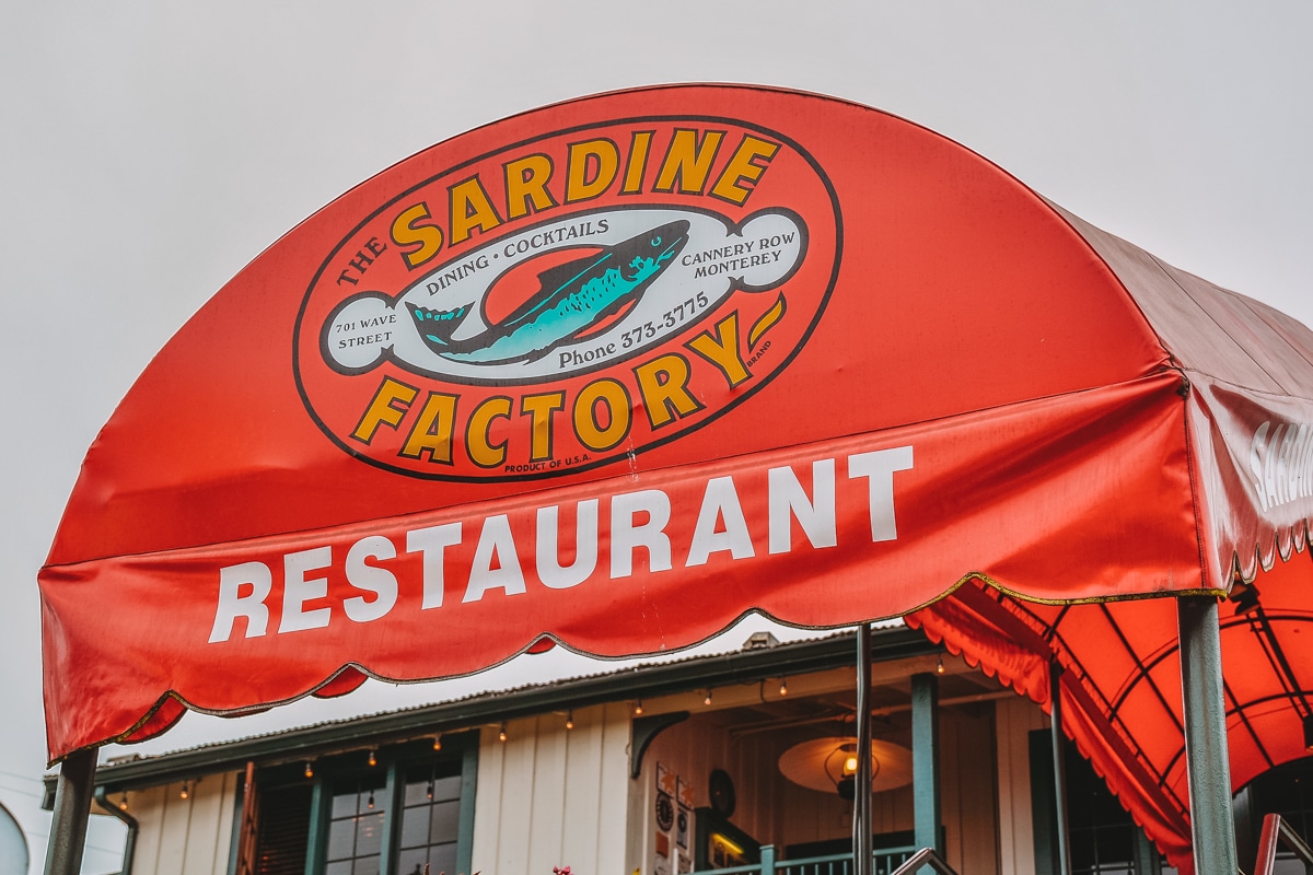 The sign for the Sardine Factory restaurant.