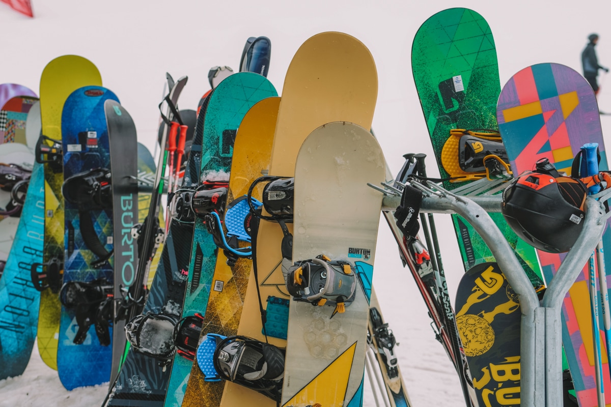 A group of rented snowboards.
