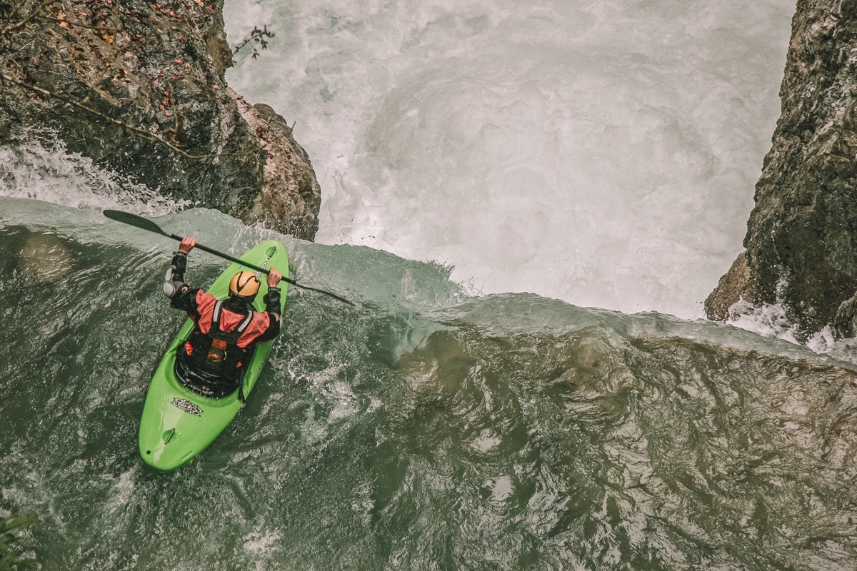 A man kayaking the toughest whitewater stretch