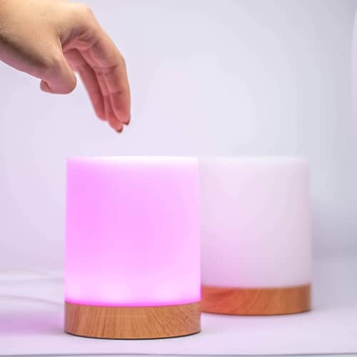 Friendship lamps by Luvlink with glowing pink light.