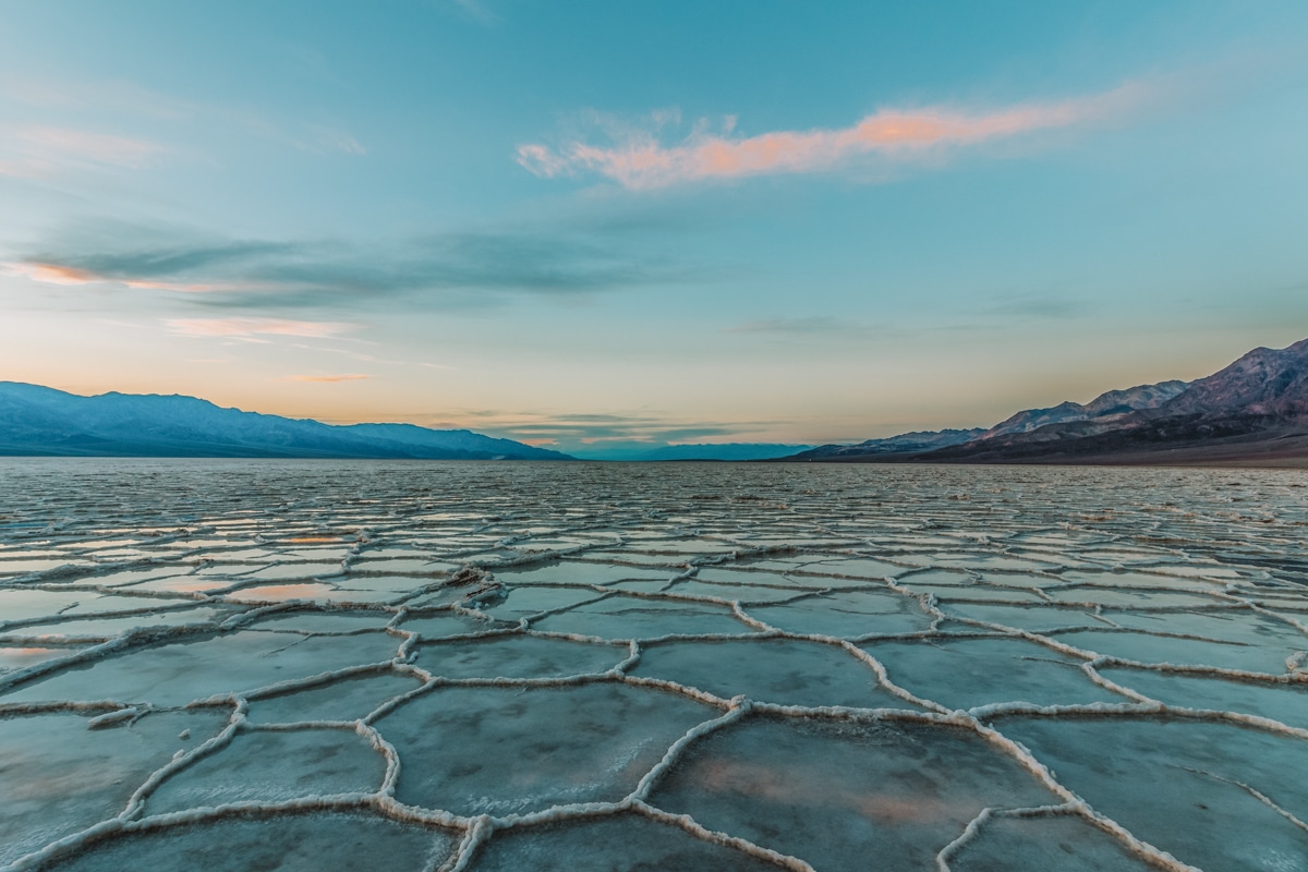 Crackled salt formations at Badwater Basin at sunset in Death Valley National Park.